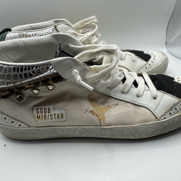 Golden Goose Mid Star Sneakers in White and Black with Gold Accents